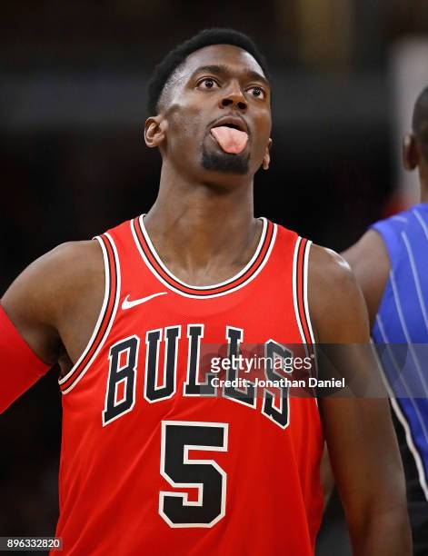 Bobby Portis of the Chicago Bulls reacts after hitting a three point shot against the Orlando Magic at the United Center on December 20, 2017 in...