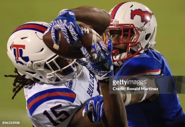 Mikial Onu of the Southern Methodist Mustangs watches the touchdown pass reception by Kam McKnight of the Louisiana Tech Bulldogs in the second...