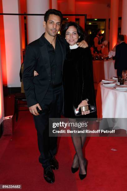 Actor Tomer Sisley and his wife Sandra attend the Gala evening of the Pasteur-Weizmann Council in Tribute to Simone Veil at Salle Pleyel on December...