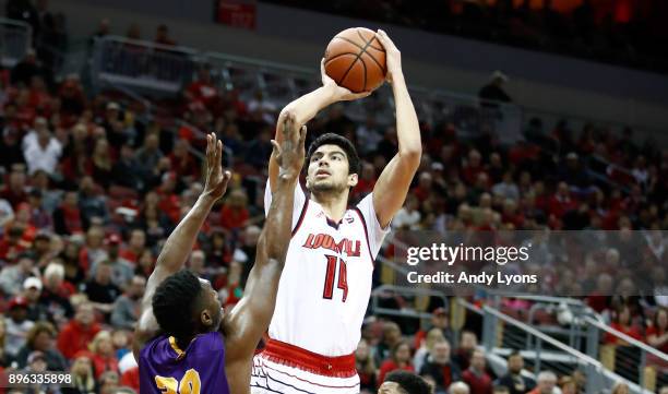 Anas Mahmoud of the Louisville Cardinals shoots the ball during the game against the Albany Great Danes at KFC YUM! Center on December 20, 2017 in...