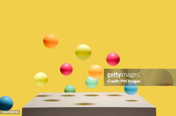 colorful balls bouncing - palla sportiva foto e immagini stock