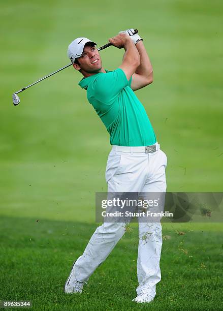 Paul Casey of England plays his approach shot on the third hole during the first round of the World Golf Championship Bridgestone Invitational on...