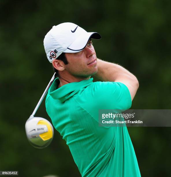 Paul Casey of England plays his tee shot on the fourth hole during the first round of the World Golf Championship Bridgestone Invitational on August...