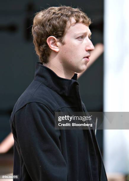 Mark Zuckerberg, chief executive officer and founder of Facebook Inc., walks outside during the Allen & Co. Media and Technology Conference in Sun...