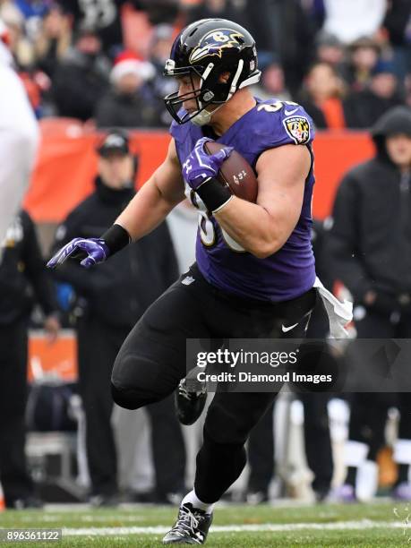 Tight end Nick Boyle of the Baltimore Ravens carries the ball downfield in the first quarter of a game on December 17, 2017 against the Cleveland...