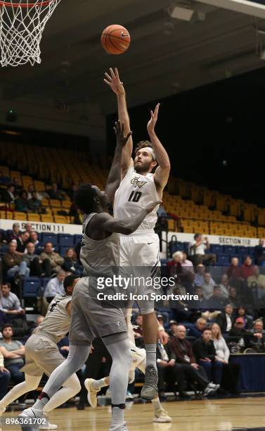 George Washington Colonials forward Patrick Steeves lobs in a shot during a college basketball game on December 20 at the Charles E. Smith Center, in...