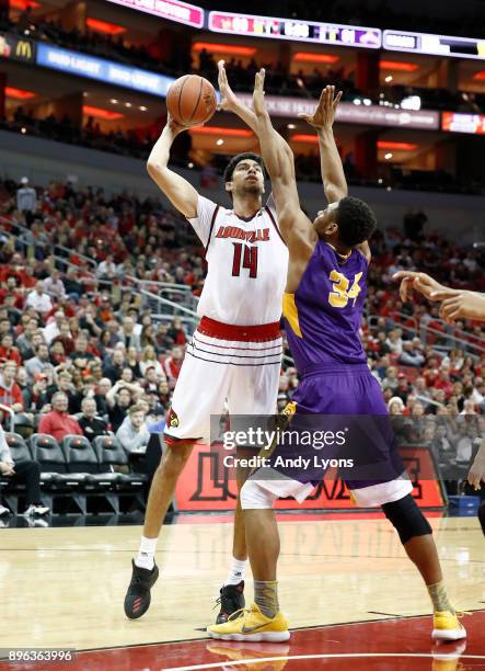 Anas Mahmoud of the Louisville Cardinals shoots the ball during the game against the Albany Great Danes at KFC YUM! Center on December 20, 2017 in...