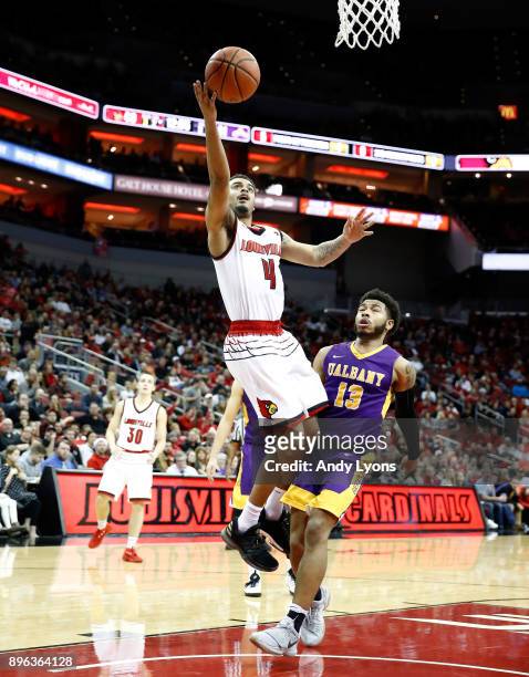 Quentin Snider of the Louisville Cardinals shoots the ball during the game against the Albany Great Danes at KFC YUM! Center on December 20, 2017 in...