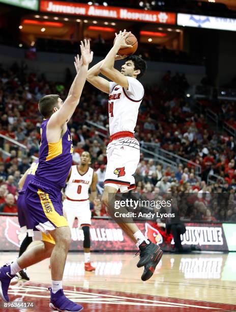 Anas Mahmoud of the Louisville Cardinals shoots the ball during the game against the Albany Great Danes at KFC YUM! Center on December 20, 2017 in...