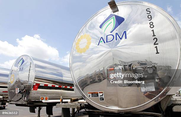 Sanitized trucks wait to be filled with corn syrup outside of the Archer Daniels Midland Co. Corn processing facility in Decatur, Illinois, U.S., on...