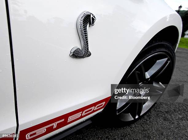 The Cobra logo is photographed on the side of a 2010 Ford Shelby Cobra GT 500 in Highland Falls, New York, U.S., on Tuesday, July 7, 2009. The Ford...