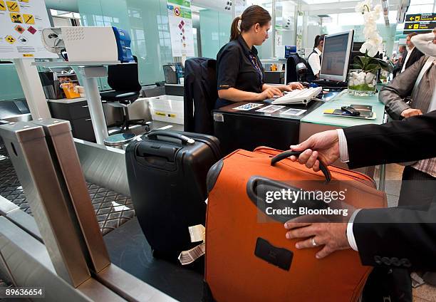 Passengers check-in their luggage at the Lufthansa desk in the new Terminal 1 building at El Prat International Airport in Barcelona, Spain, on...