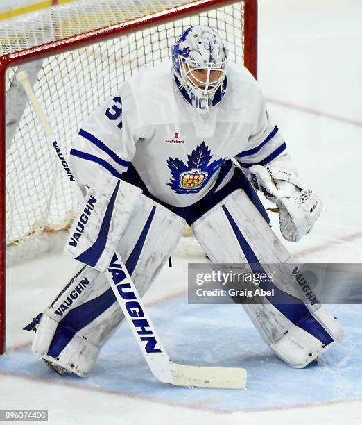 Calvin Pickard of the Toronto Marlies prepares for a shot against the Manitoba Moose during AHL game action on December 17, 2017 at Ricoh Coliseum in...