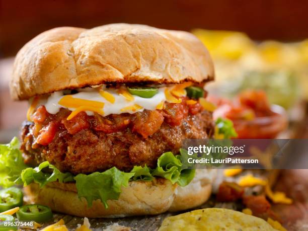 the taco seasoned burger - salsa sauce stock pictures, royalty-free photos & images