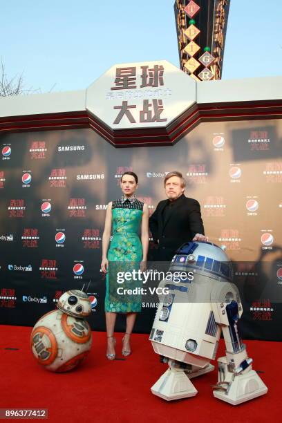 Actor Mark Hamill and actress Daisy Ridley arrive at the premiere of film 'Star Wars: The Last Jedi' at Shanghai Disney Resort on December 20, 2017...