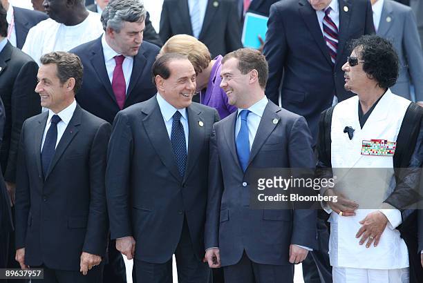 Nicolas Sarkozy, France's president, left, stands with, from left to right, Silvio Berlusconi, Italy's prime minister, Dmitry Medvedev, Russia's...