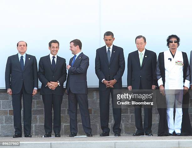 Silvio Berlusconi, Italy's prime minister, far left, stands with, from left to right, Nicolas Sarkozy, France's president, Dmitry Medvedev, Russia's...