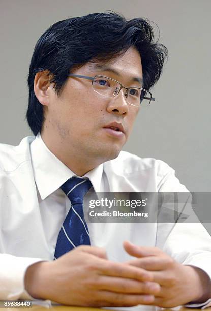Jung Joon-Ha, fund manager for the equity investment division at UBS Hana Asset Management Co., speaks during an interview at the company's...