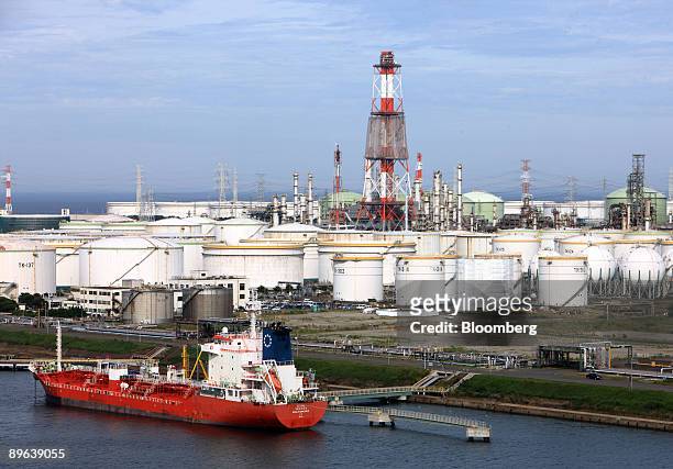 Ship is moored at an oil refinery in Kamisu city, Ibaraki prefecture, Japan, on Tuesday, July 7, 2009. Prime Minister Taro Aso pledged on June 10 to...