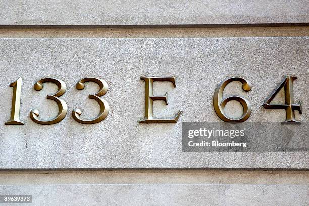 Sign marks the exterior of 133 East 64th Street, a building that houses the penthouse apartment belonging to Bernard and Ruth Madoff in New York,...