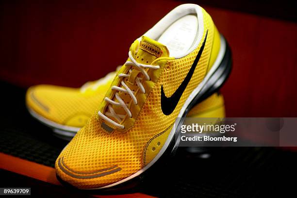 Nike Lance Armstrong "LiveStrong" sneakers sit on display at the Niketown store in New York, U.S., on Wednesday, June 24, 2009. Nike Inc., the...
