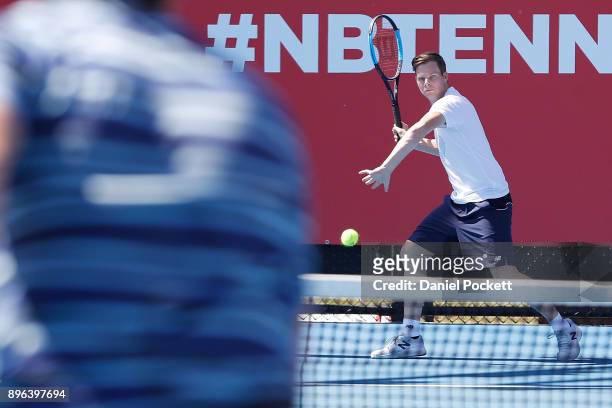Steve Smith hits a forehand during a media opportunity at Melbourne Park on December 21, 2017 in Melbourne, Australia.