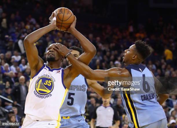 Kevin Durant of the Golden State Warriors is hit in the eye by Mario Chalmers of the Memphis Grizzlies at ORACLE Arena on December 20, 2017 in...