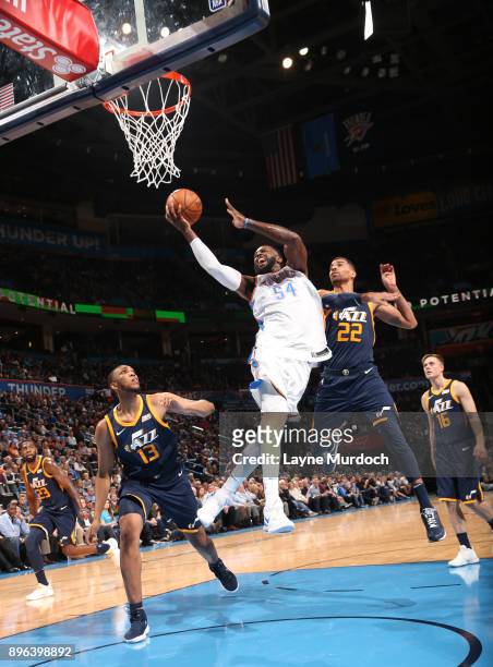 Patrick Patterson of the Oklahoma City Thunder shoots a lay up against the Utah Jazz on December 20, 2017 at Chesapeake Energy Arena in Oklahoma...