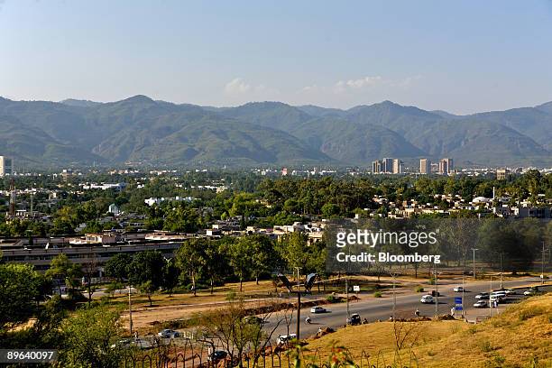 Traffic passes beneath the skyline of Islamabad, Pakistan, on Tuesday, June 23, 2009. The U.S. Says Taliban militants threaten the stability of...