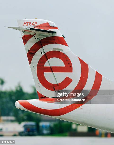 An aircraft from EuroLot, a subsidiary of Poland's national air carrier Polskie Linie Lotnicze LOT SA, sits on the tarmac at the John Paul II...