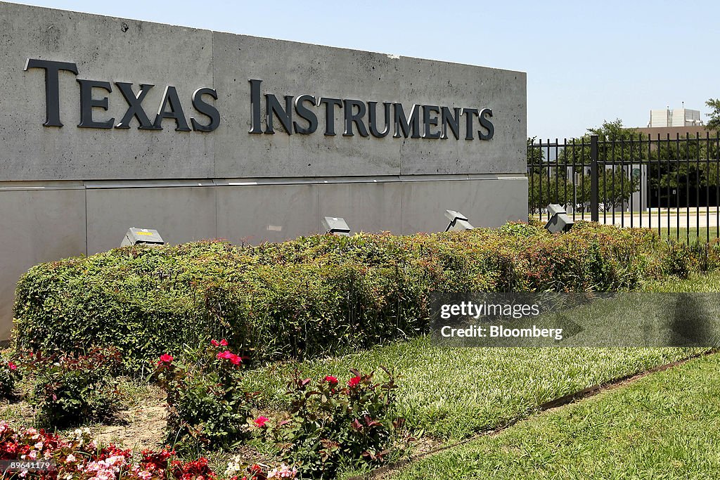 The Texas Instruments logo is displayed outside the company'