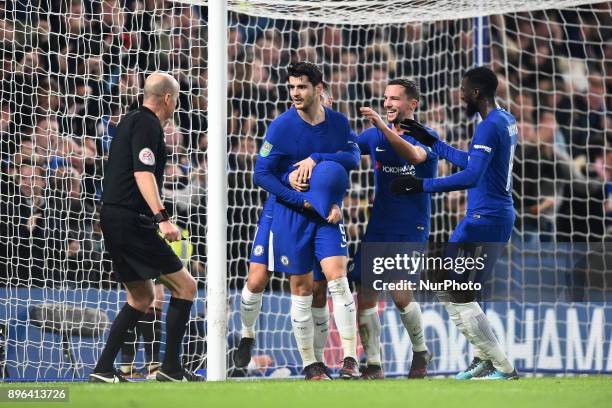 Chelsea Forward Alvaro Morata celebrates a late goal with Danny Drinkwater and Tiemoue Bakayoko during the Carabao Cup Quarter - Final match between...