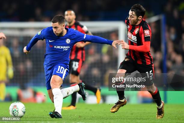 Bournemouth's Adam Smith looks to tackle Chelsea Midfielder Eden Hazard during the Carabao Cup Quarter - Final match between Chelsea and AFC...