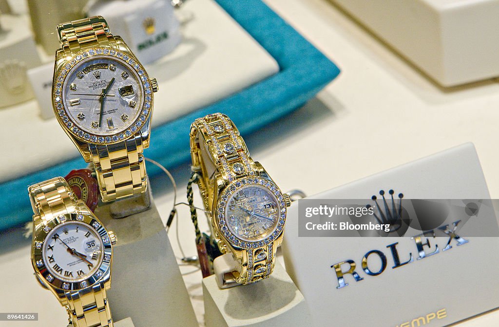 Rolex wristwatches sit on display in the window of a store i