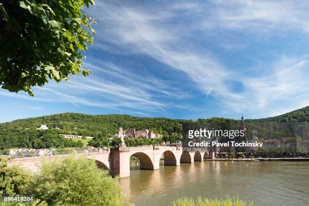 the karl theodor bridge with heidleberg old town, germany, 2017 - heidelberg stock pictures, royalty-free photos & images