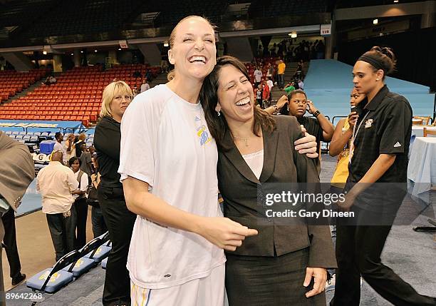 Brooke Wyckoff of the Chicago Sky hugs WNBA President Donna Orender before the WNBA game against the Los Angeles Sparks on July 29, 2009 at the UIC...