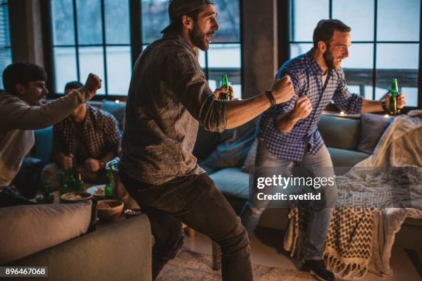 i love this game - man cave stock pictures, royalty-free photos & images