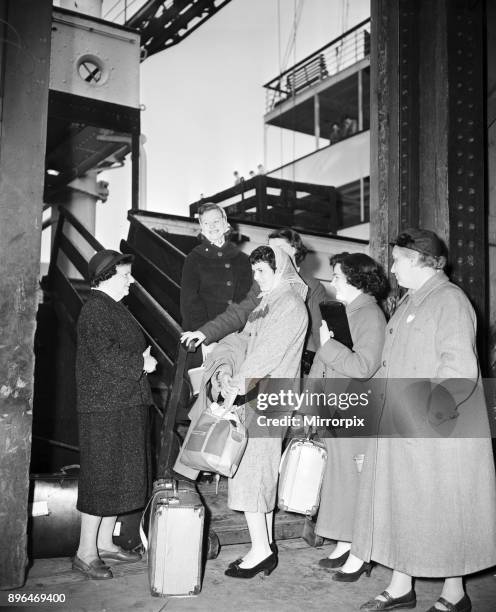 Beatrice Blyth of the Liverpool Vigilance Association, a group of housewives organised to fight vice, pictured waiting on the docks for new arrivals...