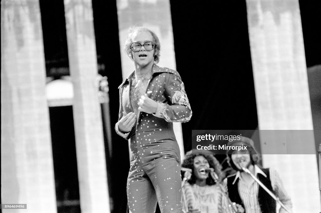 Elton John performing on stage at Wembley Stadium., London, England