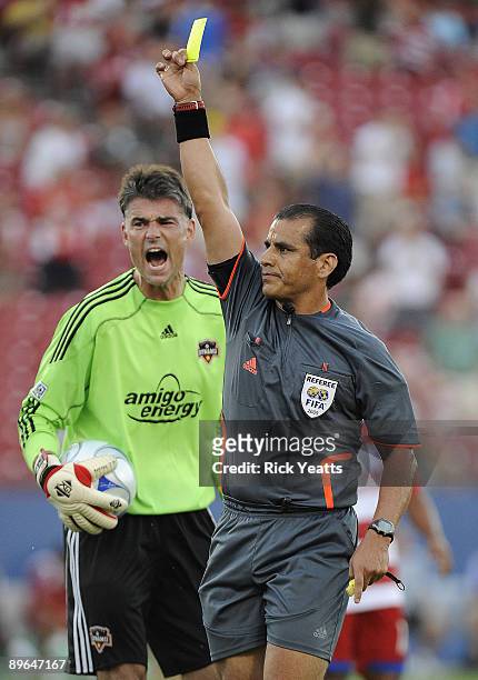 Pat Onstad of the Houston Dynamo reacts to receiving a yellow card from referee Baldomero Toledo at Pizza Hut Park August 6, 2009 in Frisco, Texas.