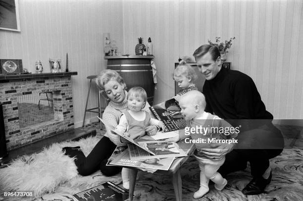 Billy McNeill, Celtic centre half and captain, 24 years old, pictured in his home in Cathcart, Glasgow with his wife Elizabeth, two year old twins...