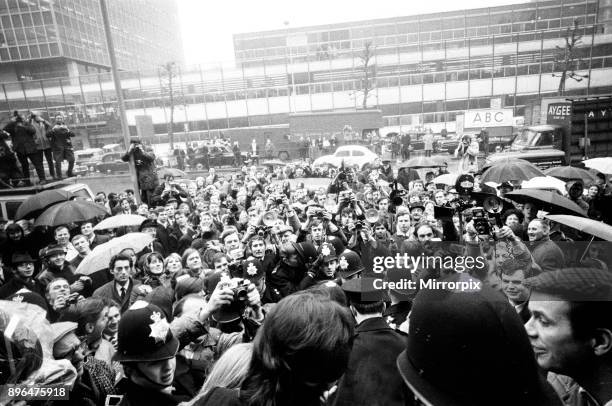 Civil Wedding of Paul McCartney & Linda Eastman at Marylebone Register Office London Paul McCartney is centre, long dark hair, back to camera holding...