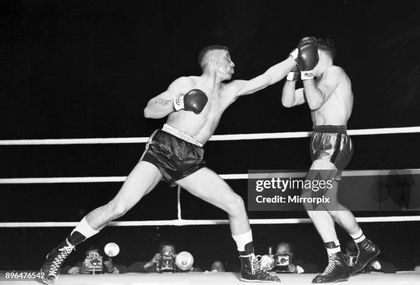 Randolph Turpin v Charles Numez, pictured in ring, fighting for vacant EBU middleweight title , at the White City Stadium, White City, London,...