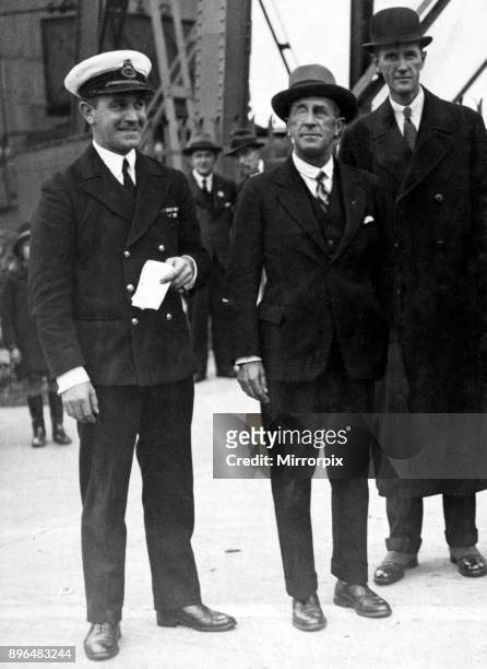 Left, Squadron-Leader E L Johnston, middle, Sir Sefton Brancker, Director of Civil Aviation. Both died aboard the R101 airship which crashed at...