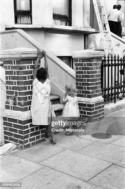 Residents of Berrymede Road, Chiswick, following the discovery of the body of murder victim Mary Flemming the 14th July 1964. Her strangled body was...