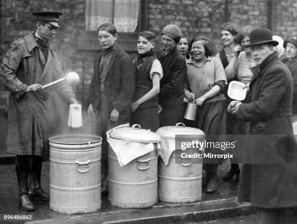 The line up for free soup distributed by the Salvation Army Soup Kitchen, which was warmly welcomed when it visited Gateshead, 30th January 1934.