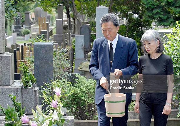 Democratic Party of Japan president Yukio Hatoyama and his wife Miyuki visit the grave of Hatoyama's grandfather Ichiro Hatoyama at Yanaka Cemetary...