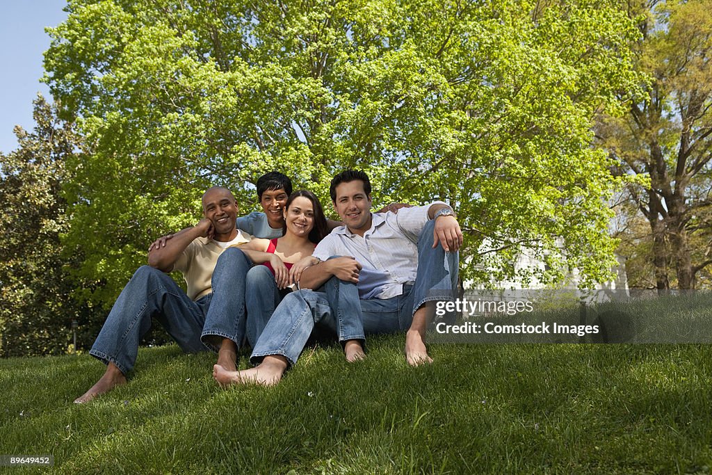 Friends sitting on grass