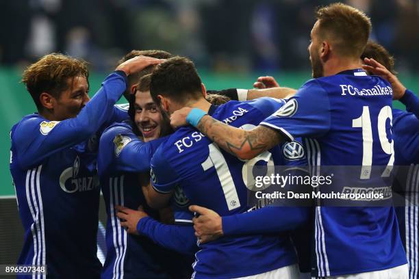 Max Meyer of Schalke 04 celebrates scoring his teams first goal of the game with team mates during the DFB Pokal match between FC Schalke 04 and 1....