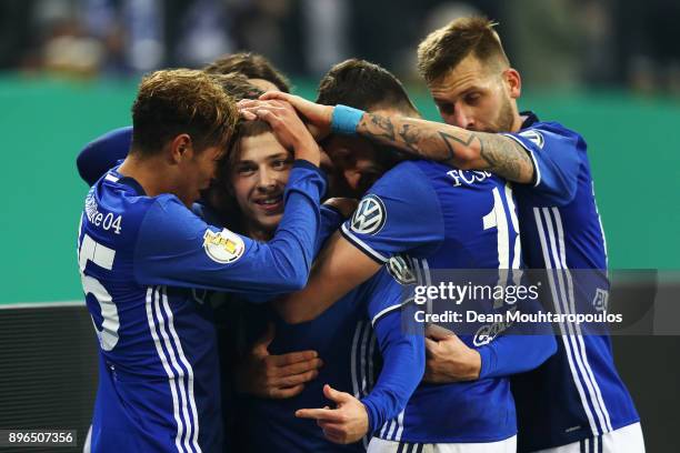 Max Meyer of Schalke 04 celebrates scoring his teams first goal of the game with team mates during the DFB Pokal match between FC Schalke 04 and 1....